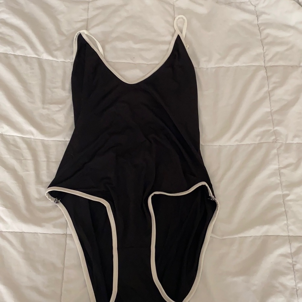Black and white body suit